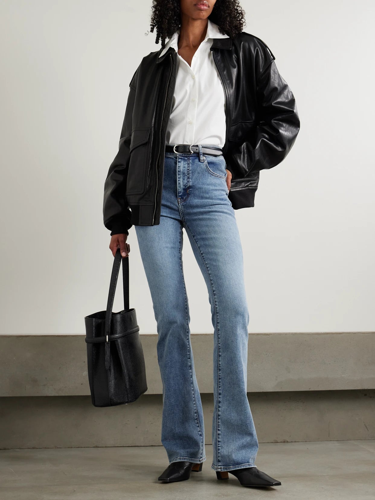 Image of Jeans. Product name - The Reboot Mid-rise Bootcut Jeans in Mid denim colour by brand - FRAME