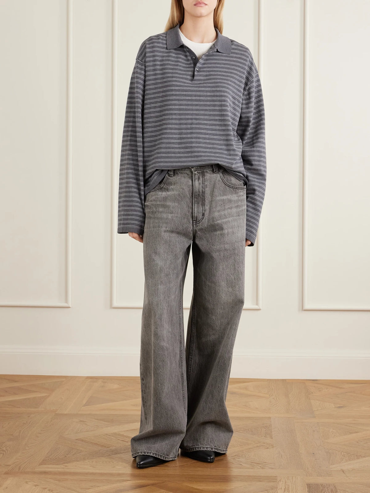 Image of a model wearing Outerwear. Product name - Foley Stripe Cotton Polo Shirt in Gray colour by brand - Nili Lotan