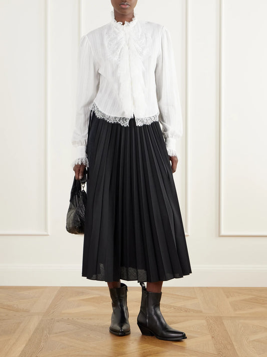 Image of a model wearing Tops. Product name - Freda Cropped Ruffled Lace-trimmed Openwork Cotton-jacquard Blouse in Off-white colour by brand - Ann Demeulemeester