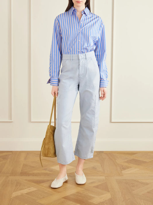 Image of a model wearing Pants. Product name - Marcelle Cotton Tapered Cargo Pants in Blue colour by brand - Citizens of Humanity
