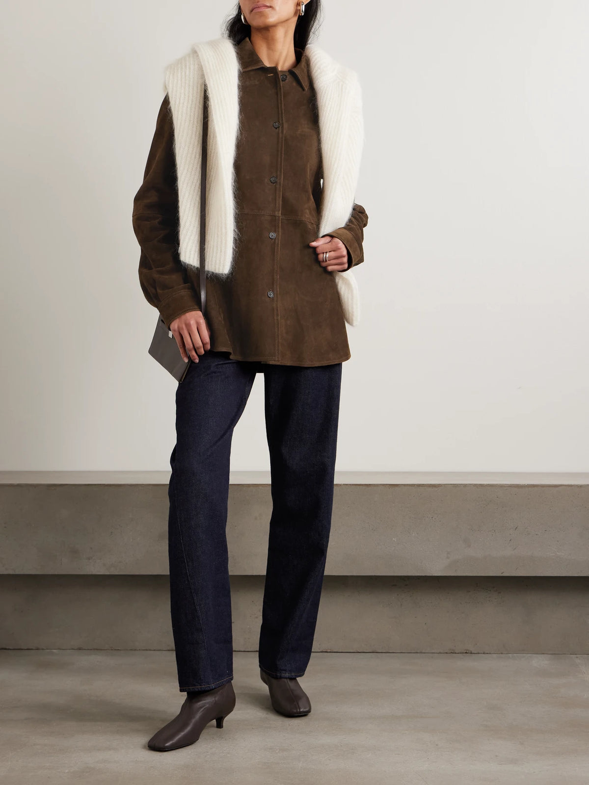 Image of a model wearing Tops. Product name - Suede Jacket in Brown colour by brand - TOTEME