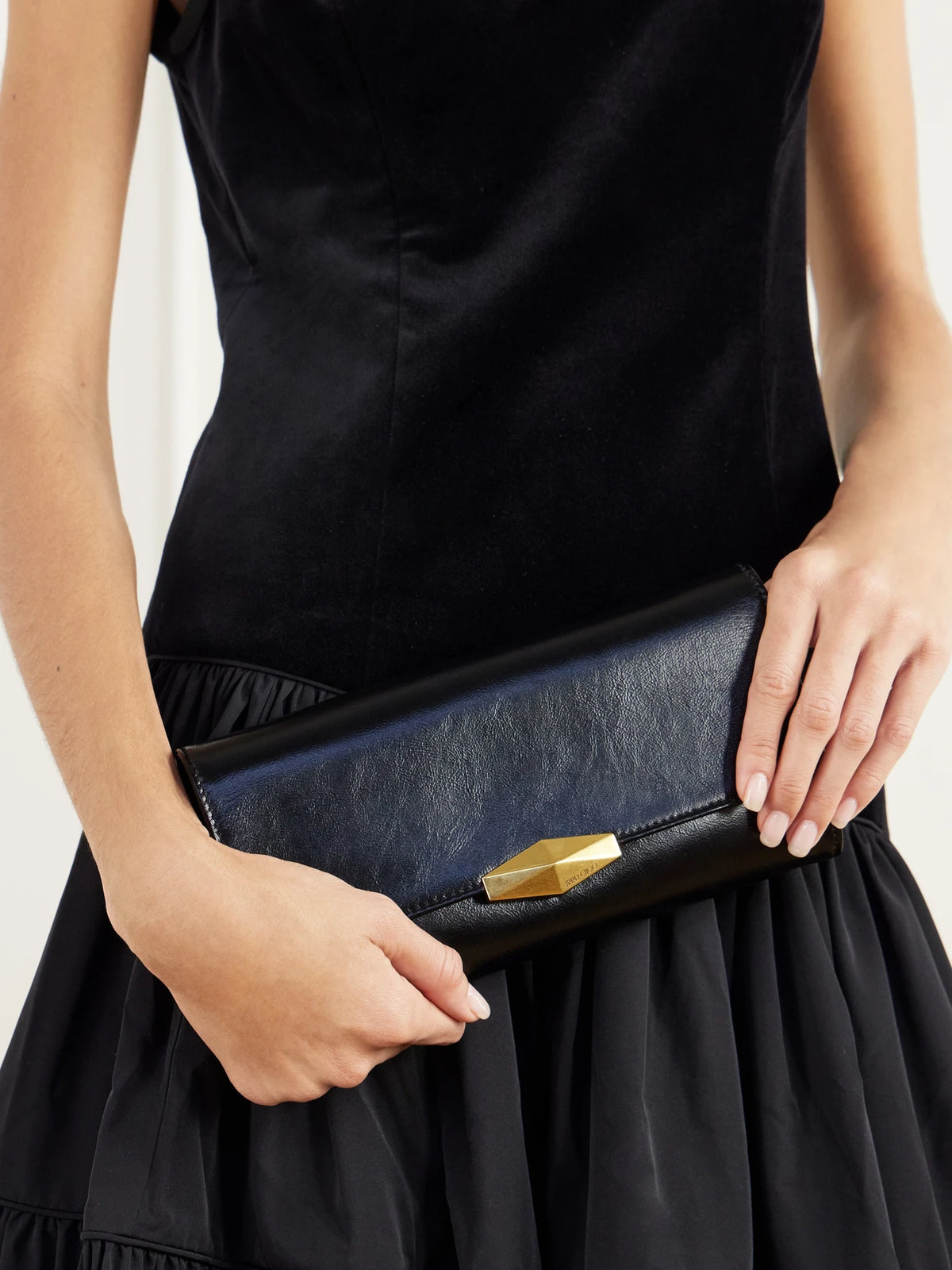 Image of Bags. Product name - Cinch Leather Clutch in Black colour by brand - Jimmy Choo