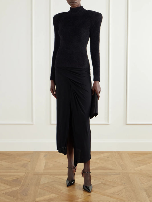 Image of a model wearing Outerwear. Product name - Ribbed-knit Turtleneck Sweater in Black colour by brand - Balmain
