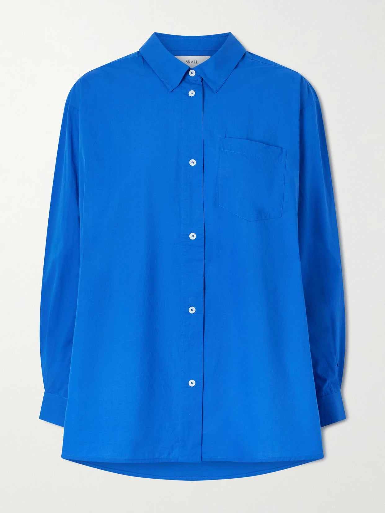 Image of a model wearing Tops. Product name - Edgard Organic Cotton-poplin Shirt in Blue colour by brand - SKALL