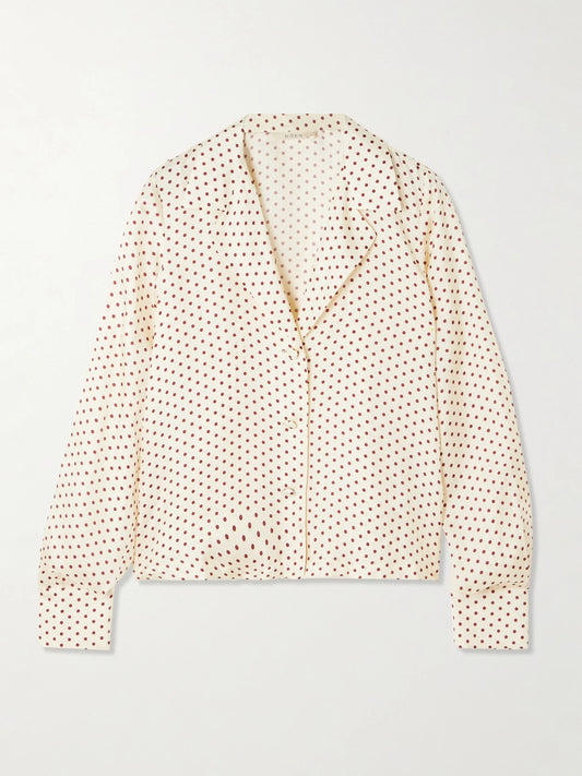 Image of a model wearing Tops. Product name - Elene Polka-dot Silk-blend Twill Blouse in Cream colour by brand - DÔEN