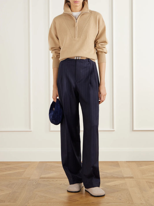 Image of a model wearing Outerwear. Product name - Troyer Cashmere Half-zip Polo Sweater in Beige colour by brand - Allude