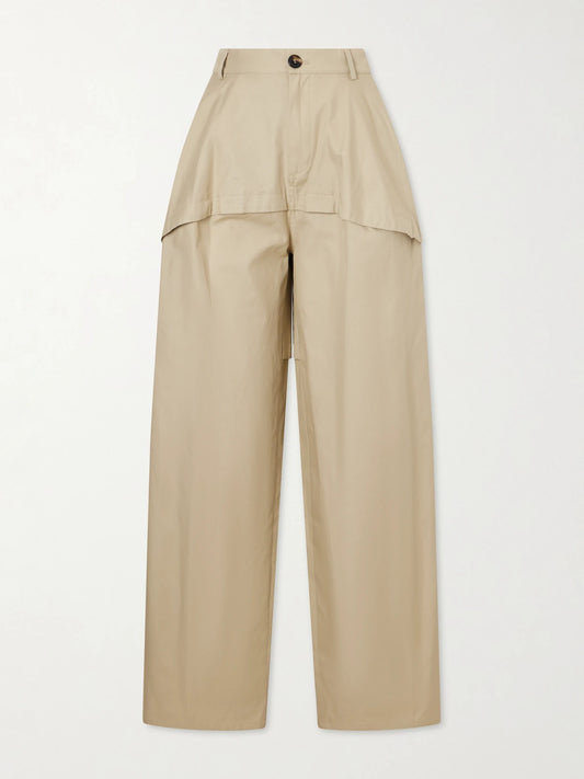 Image of a model wearing Pants. Product name - + Paula's Ibiza Paneled Cotton Gabardine Wide-leg Pants in Beige colour by brand - LOEWE
