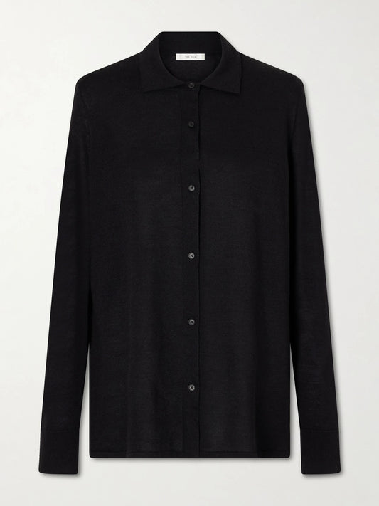 Image of a model wearing Outerwear. Product name - Ocari Cashmere And Silk-blend Polo Knit in Black colour by brand - The Row