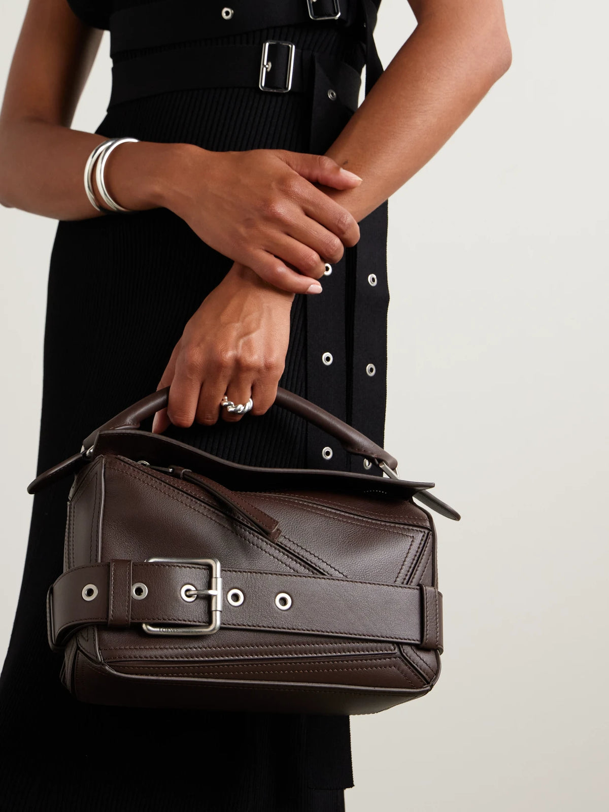 Image of Bags. Product name - Puzzle Biker Small Belted Leather Tote in Dark brown colour by brand - LOEWE