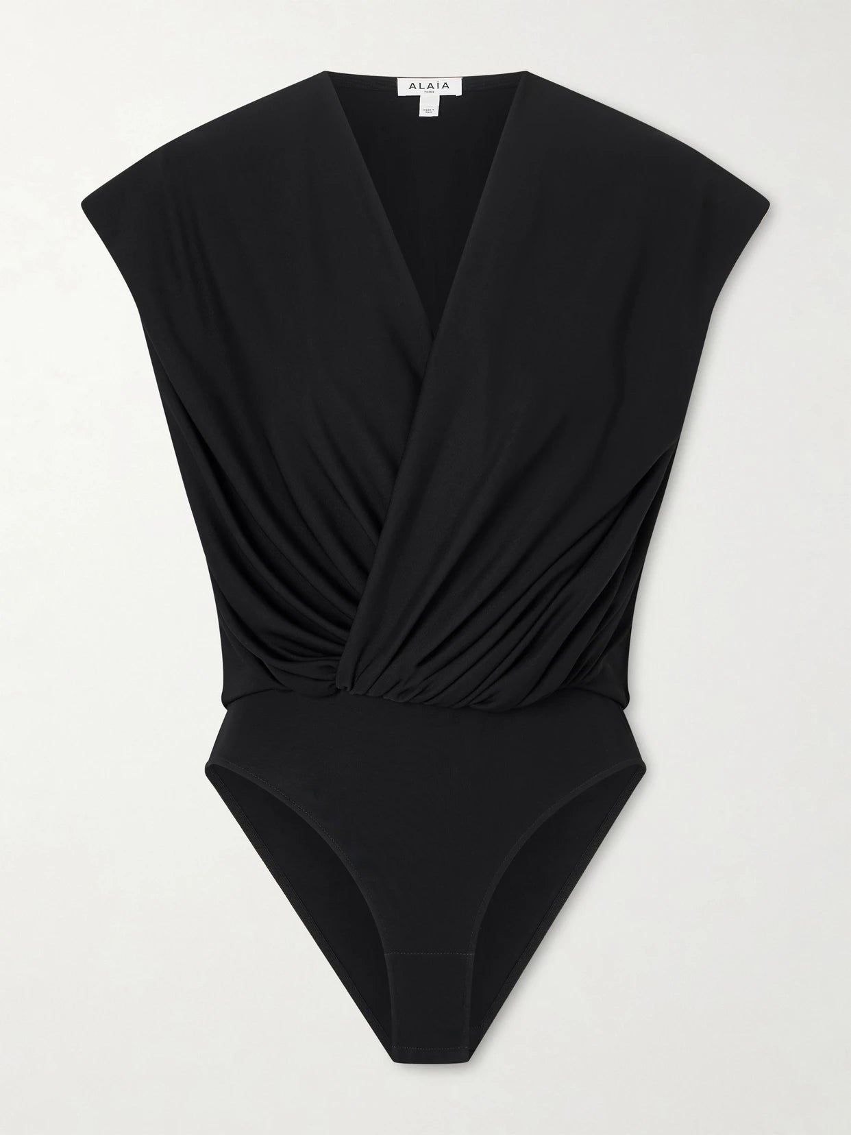 Image of a model wearing Tops. Product name - Hooded Draped Jersey Bodysuit in Black colour by brand - Alaïa