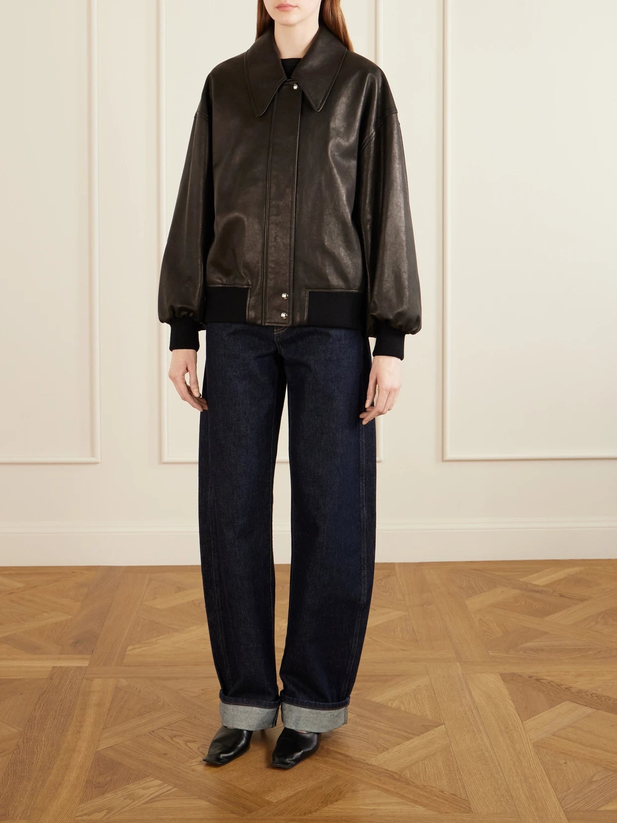 Image of Coats & Jackets. Product name - Shelman Leather Bomber Jacket in Black colour by brand - KHAITE