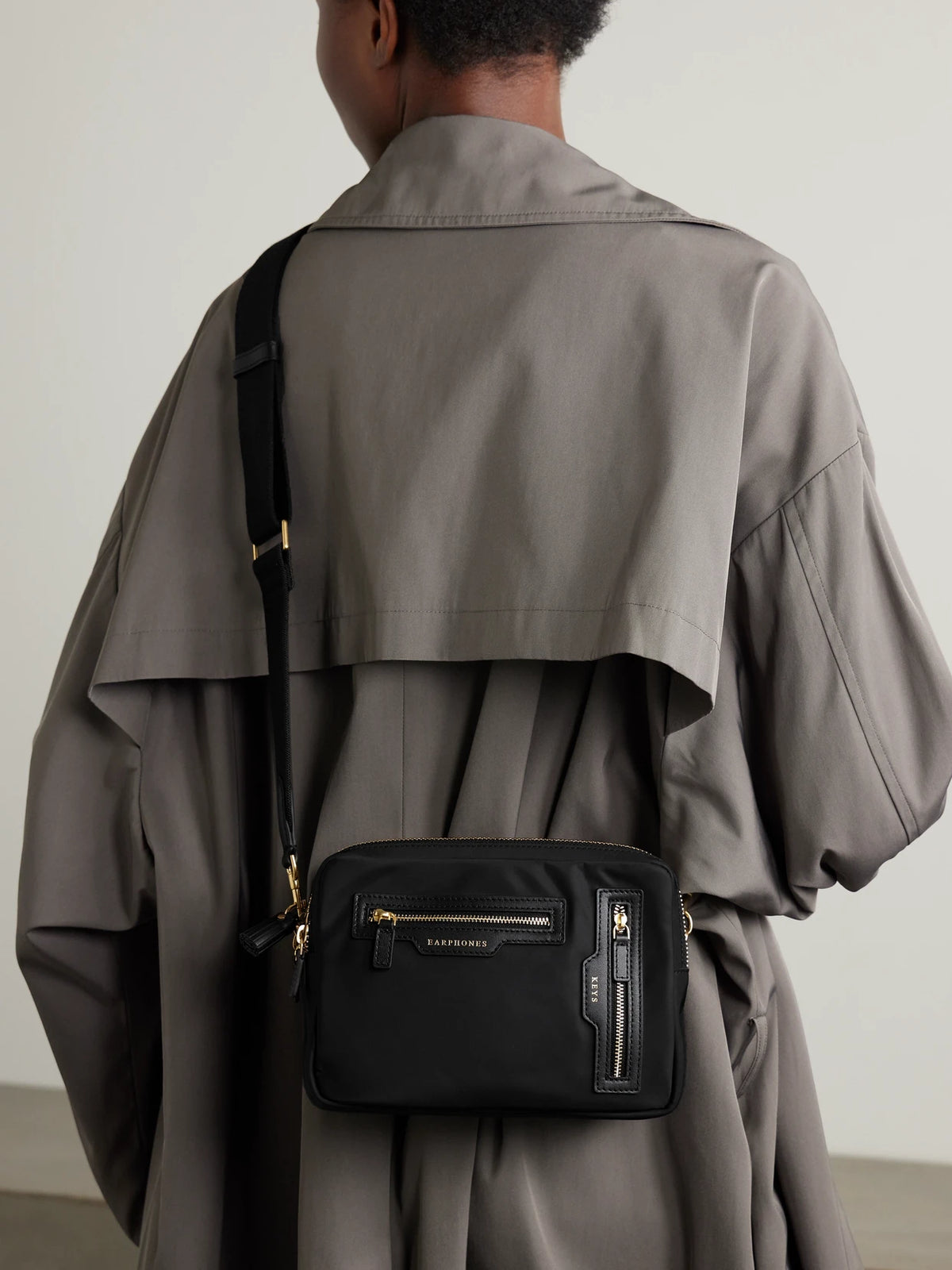 Image of Bags. Product name - Leather-trimmed Econyl Shoulder Bag in Black colour by brand - Anya Hindmarch
