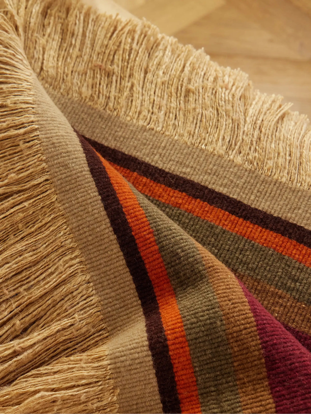 The House of Lyria Grottesco Fringes Striped Woven Throw