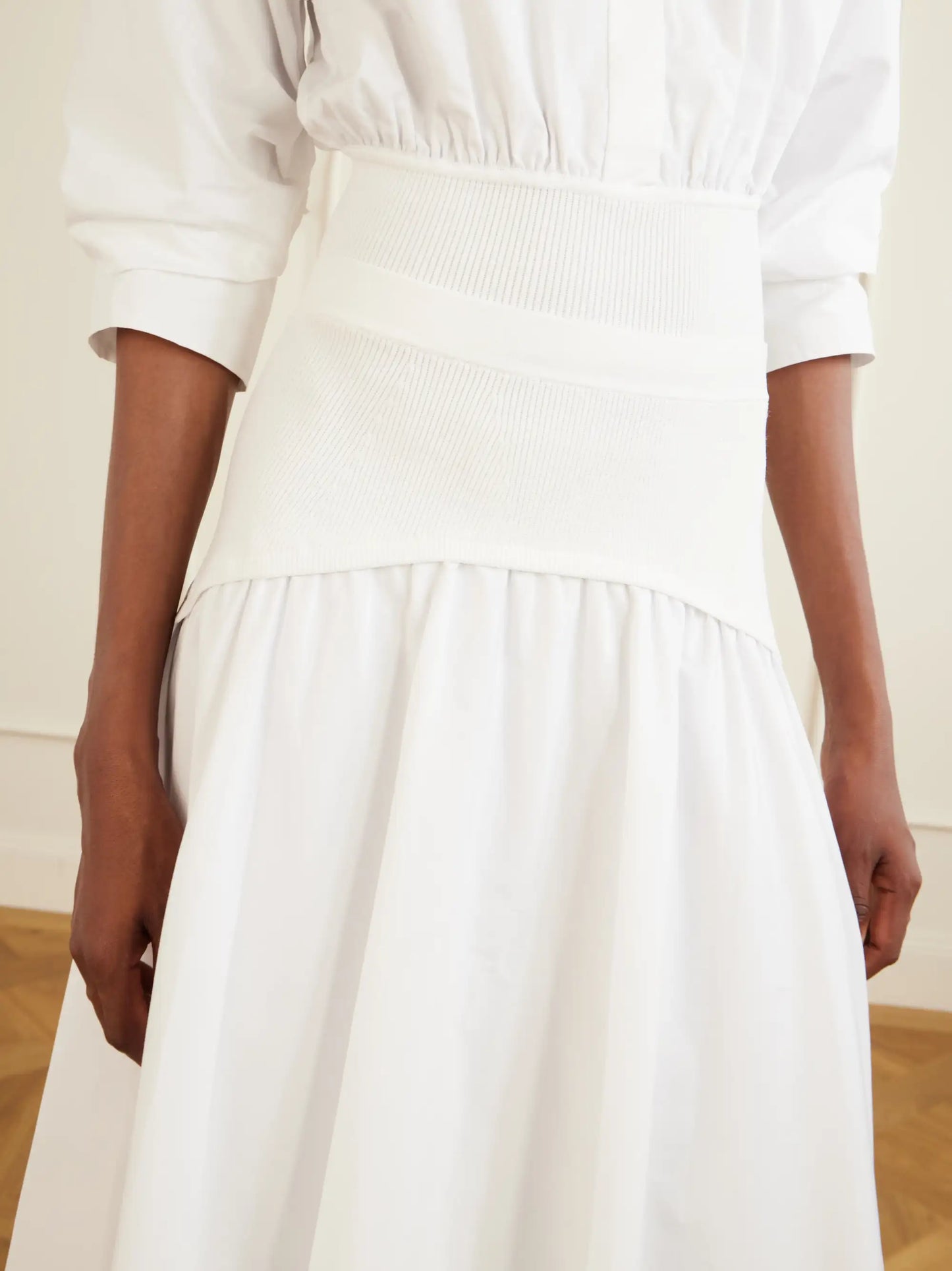 Ovie Pleated Ribbed Cotton-poplin Midi Skirt