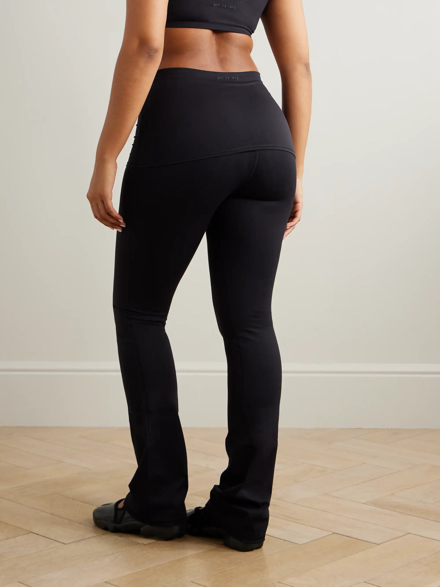 + Nike Foldover Slim Flare Legging - Obsidian