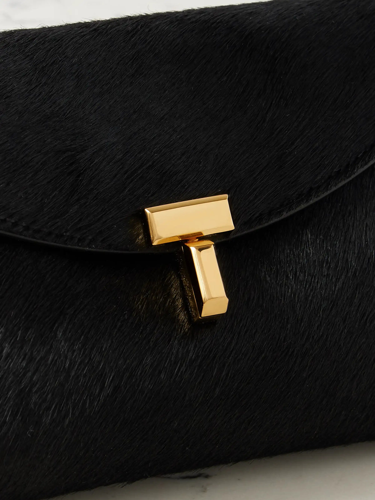 T-lock Mini Calf Hair Clutch