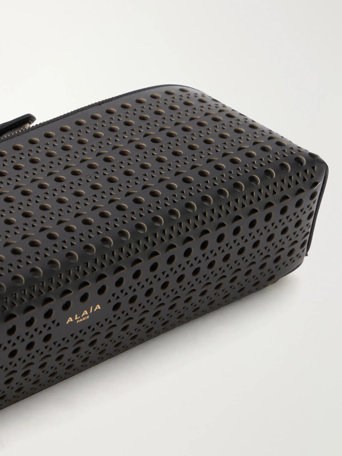 Alaïa Delta Laser-cut Leather Clutch