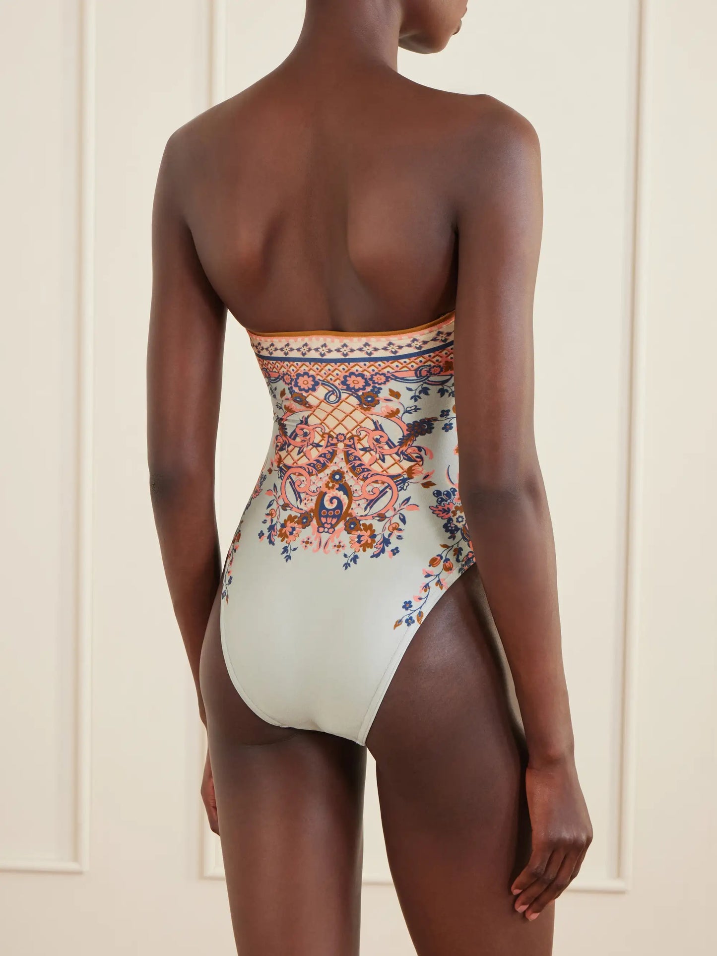 Aster Strapless Knot-detailed Cut-out Printed Swimsuit