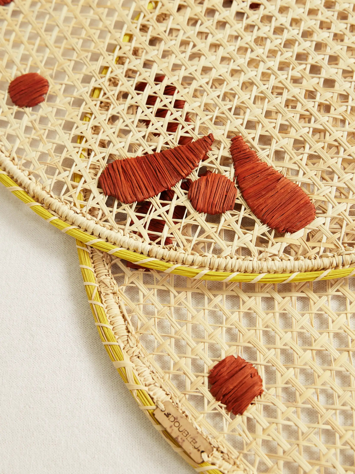 Set Of Two Embroidered Raffia Placemats