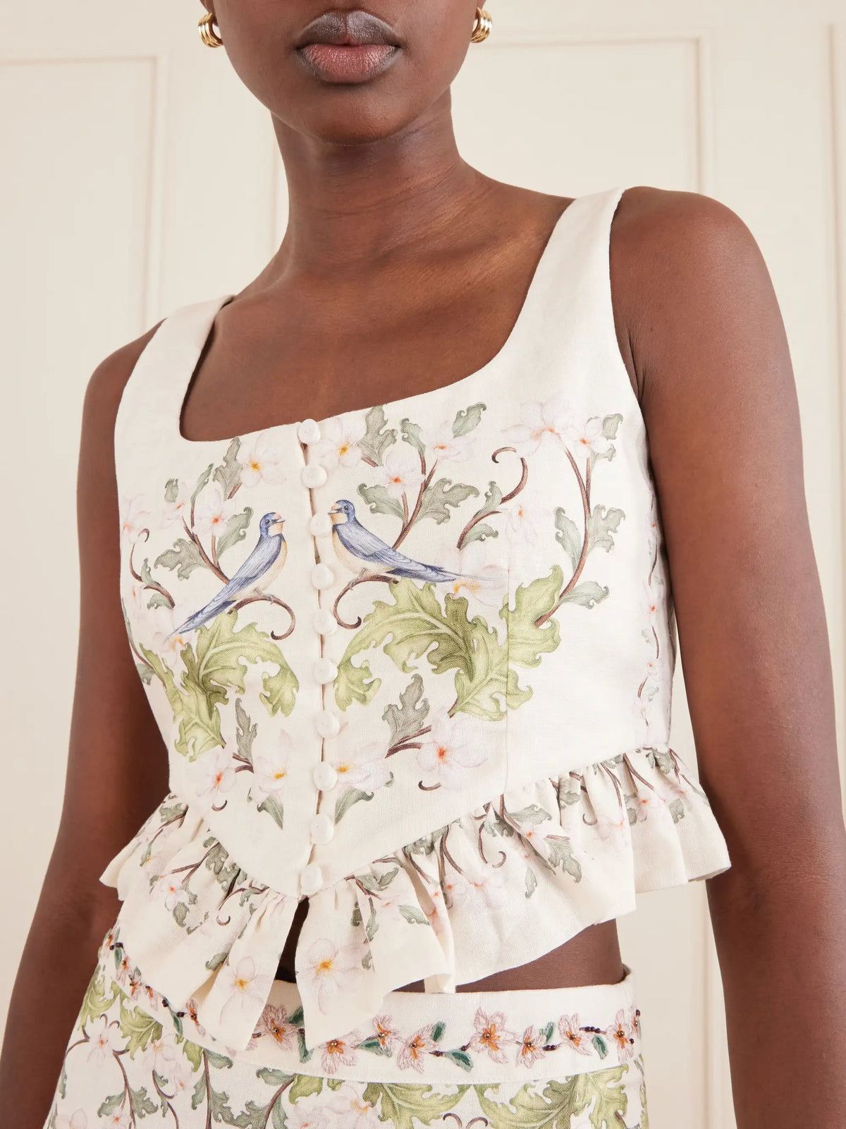 Agua by Agua Bendita Eslabon Anhelo Floral-print Button-embellished Linen Cropped Top