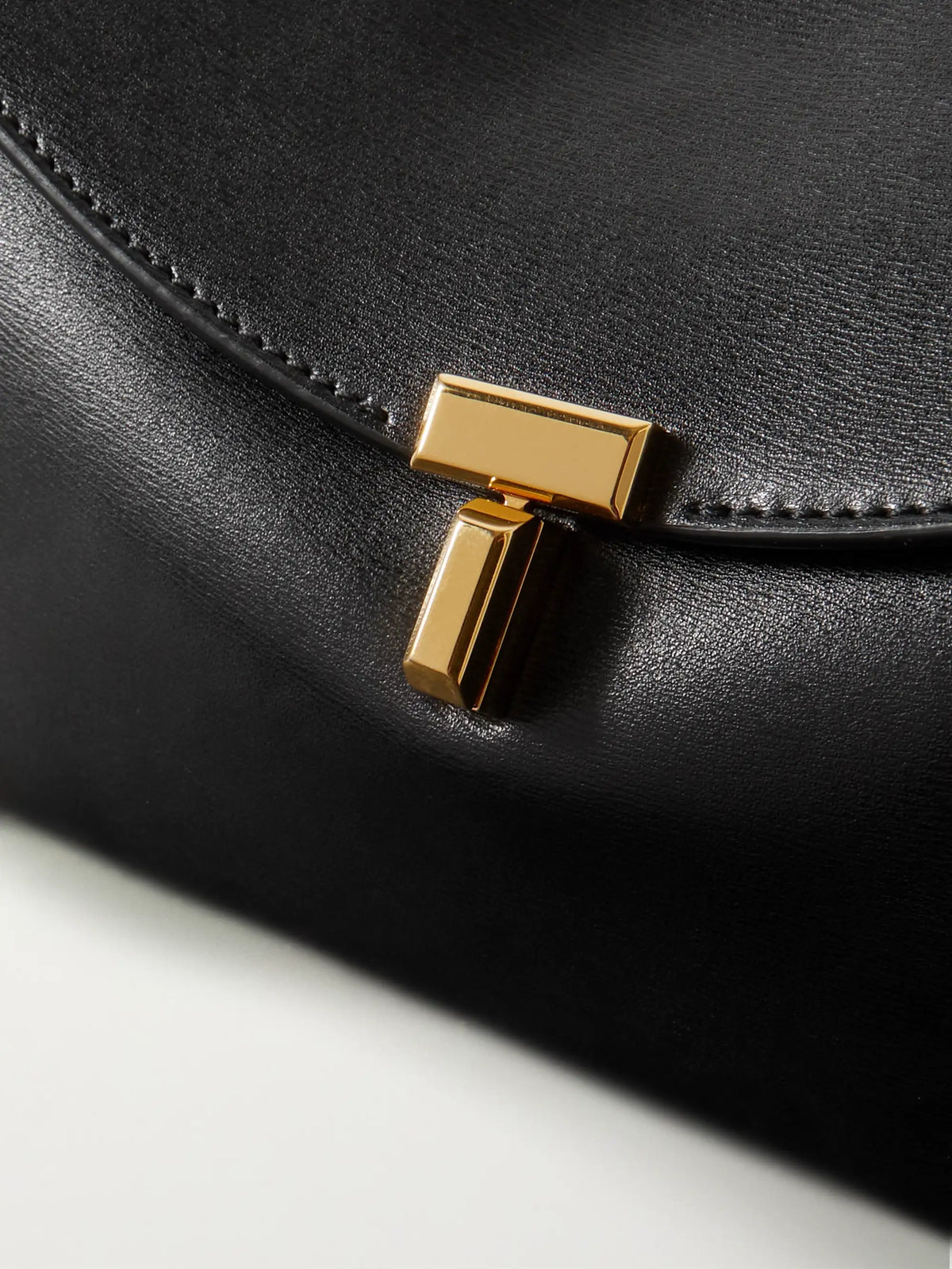 T-lock Leather Clutch