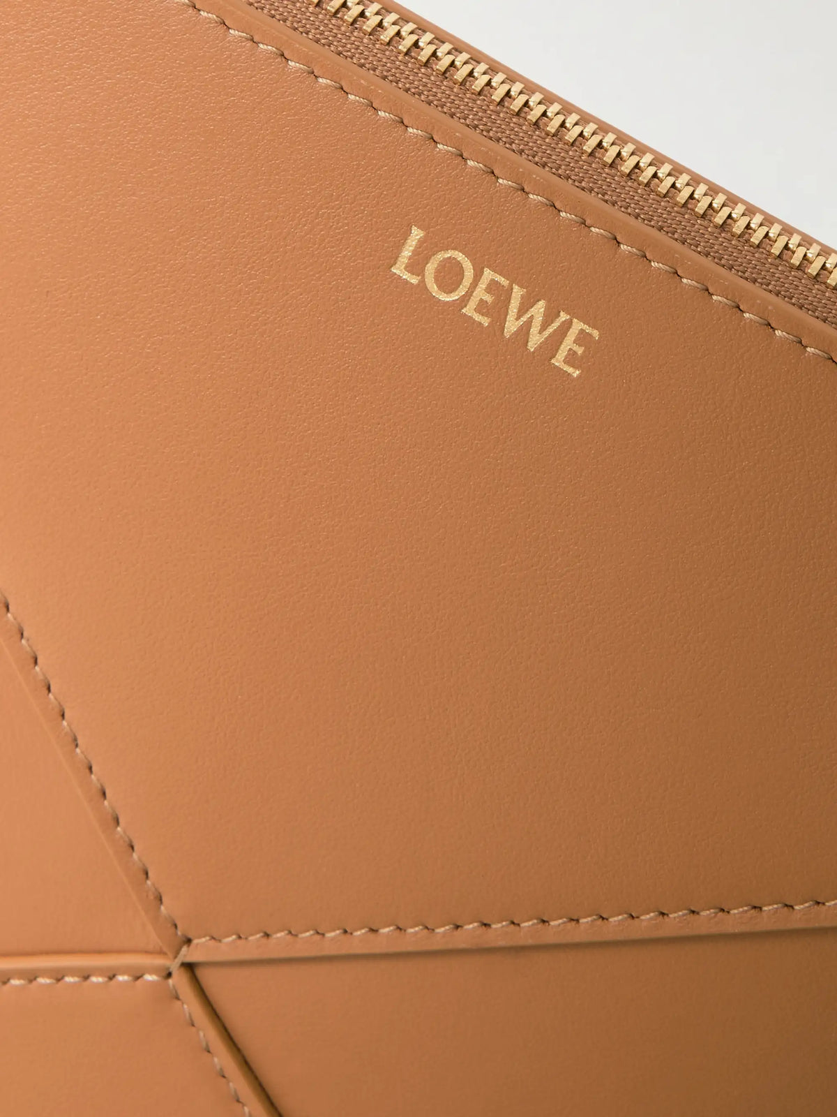 Puzzle Fold Leather Clutch