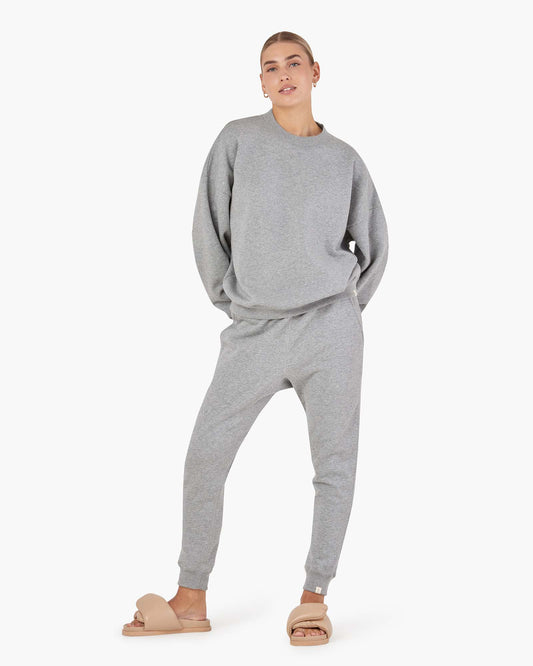 Image of a model wearing Outerwear. Productname: Core Fleece Crewneck Grey Mix in Grey Mix colour by brand - TKEES