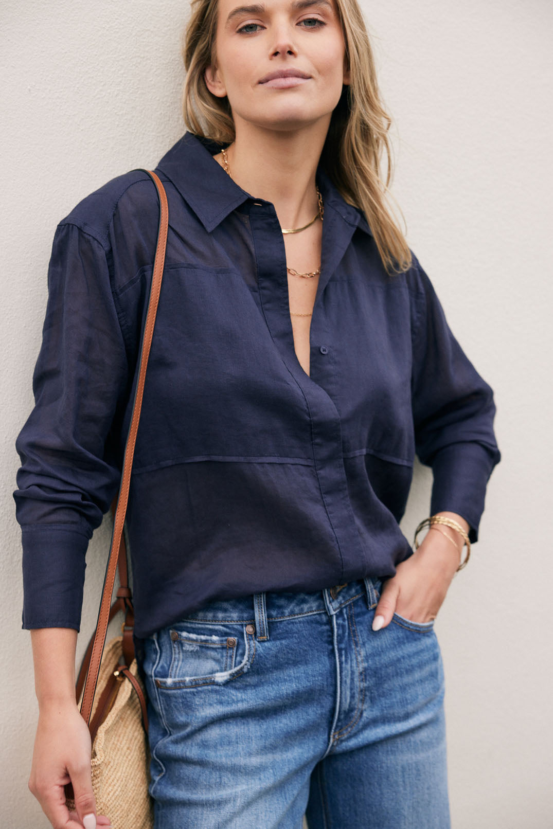 Image of a model wearing Tops. Product name - Chloe Panel Shirt Navy in Navy colour by brand - White & Co.