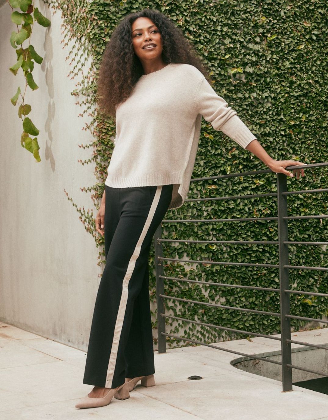 Image of a model wearing Pants. Productname: Timeless Straight Leg Ponte Pant - in Black/Natural colour by brand - White & Co.