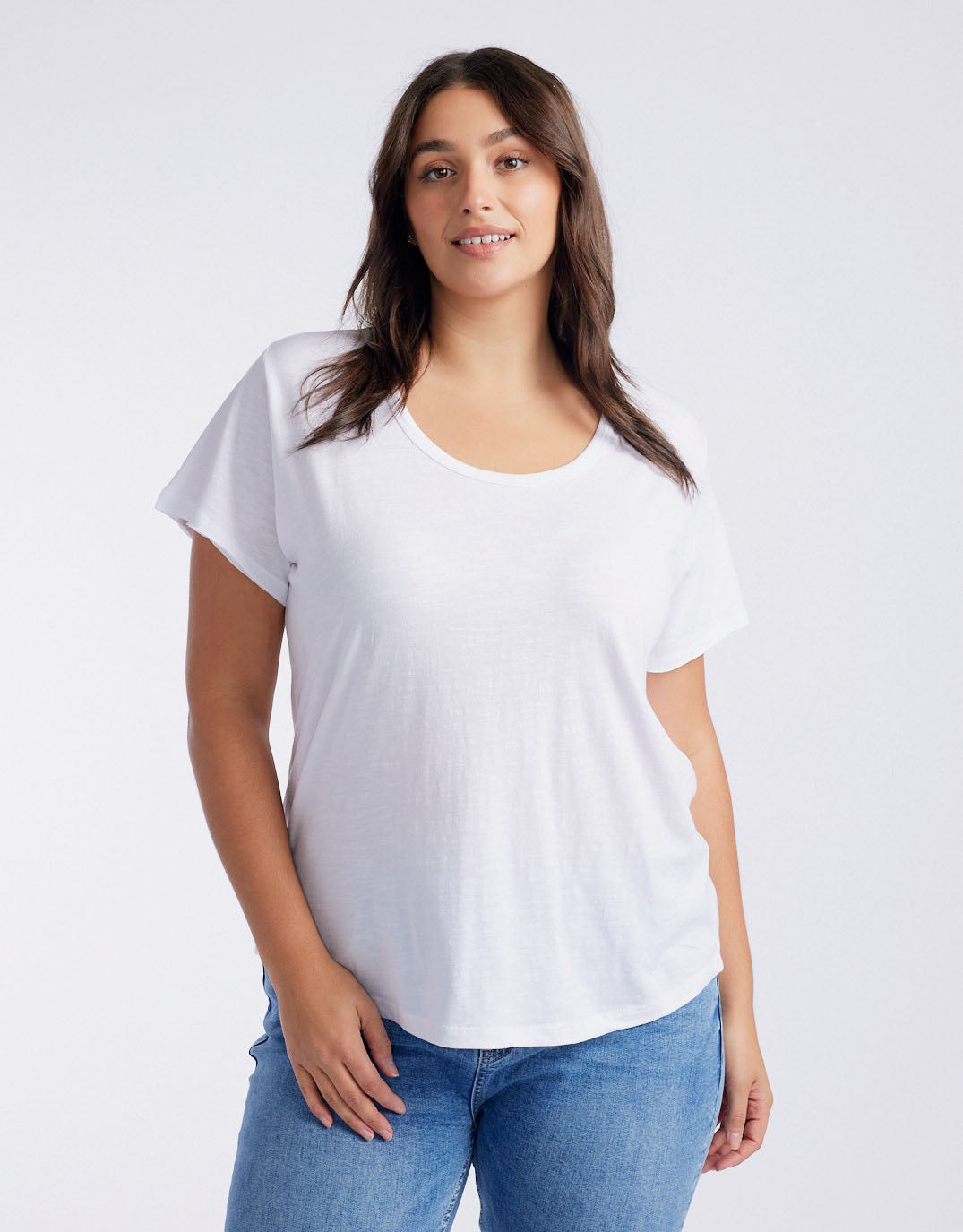 Image of a model wearing Tops. Productname: Original Round Neck T-Shirt - in White colour by brand - White & Co.
