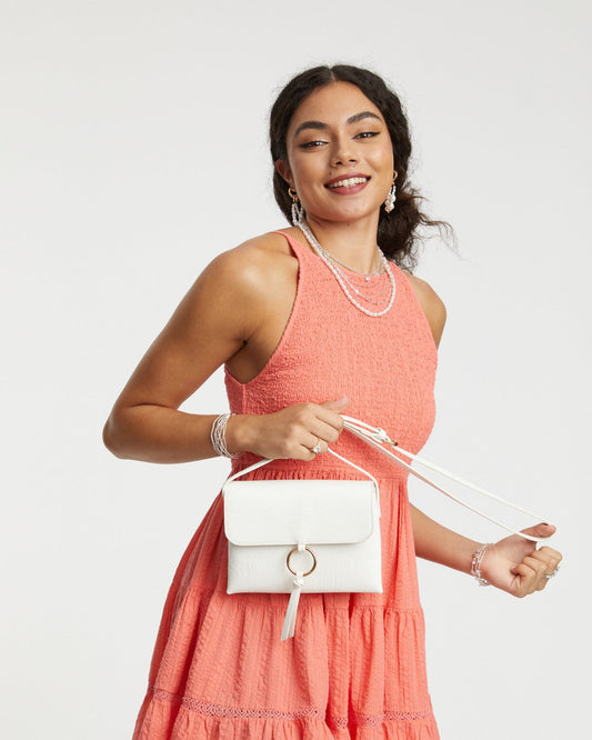 Image of Bags. Productname: White Brooklyn Crossbody Bag in White colour by brand - Colette