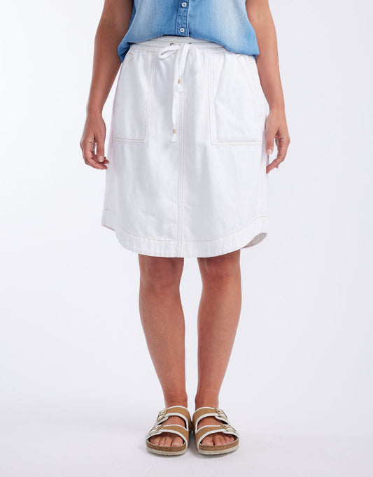 Image of a model wearing Skirts. Productname: Coco Denim Skirt - in White colour by brand - White & Co.