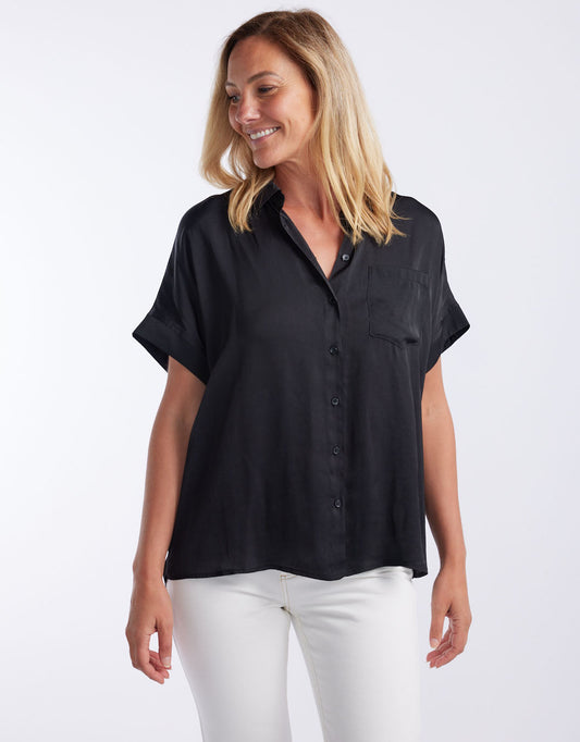 Image of a model wearing Tops. Productname: Effortless Drape Shirt - in Black colour by brand - White & Co.