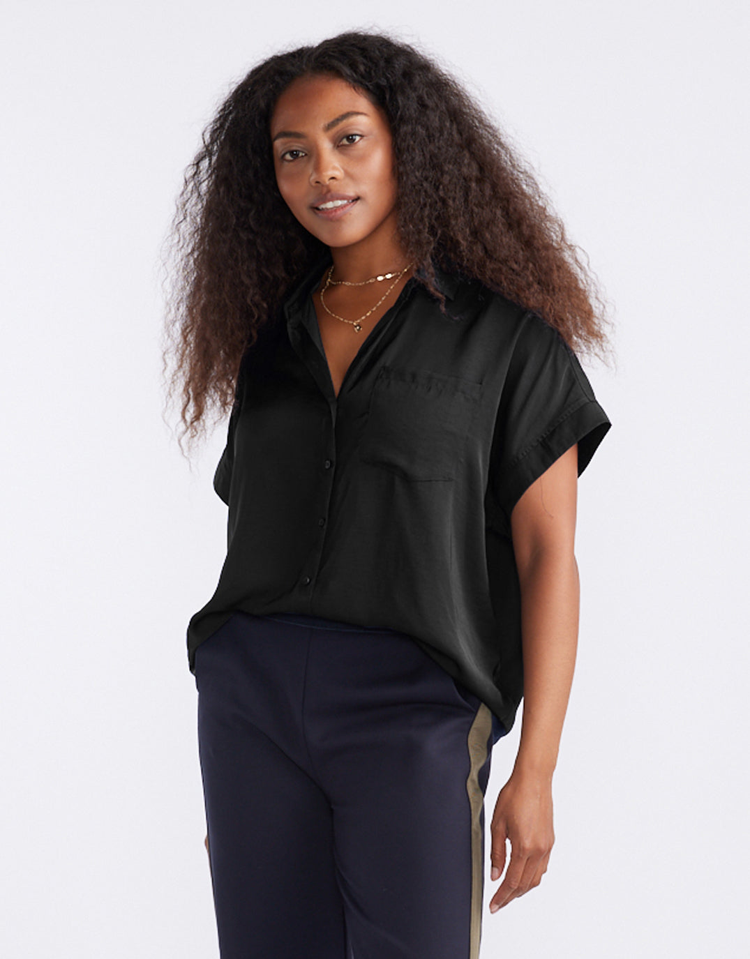 Image of a model wearing Tops. Productname: Effortless Drape Shirt - in Black colour by brand - White & Co.