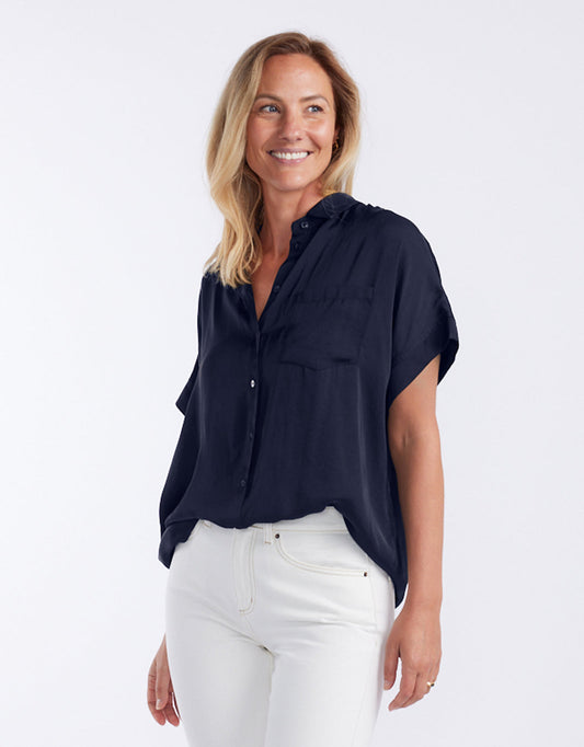 Image of a model wearing Tops. Productname: Effortless Drape Shirt - in Dark Navy colour by brand - White & Co.