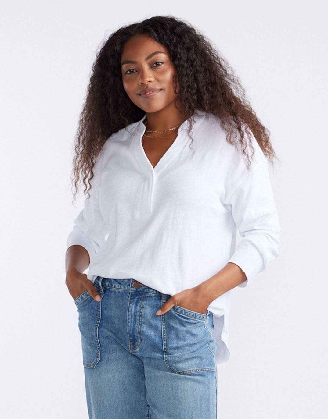 Image of a model wearing Tops. Productname: Henley Sunset Top - in White colour by brand - White & Co.