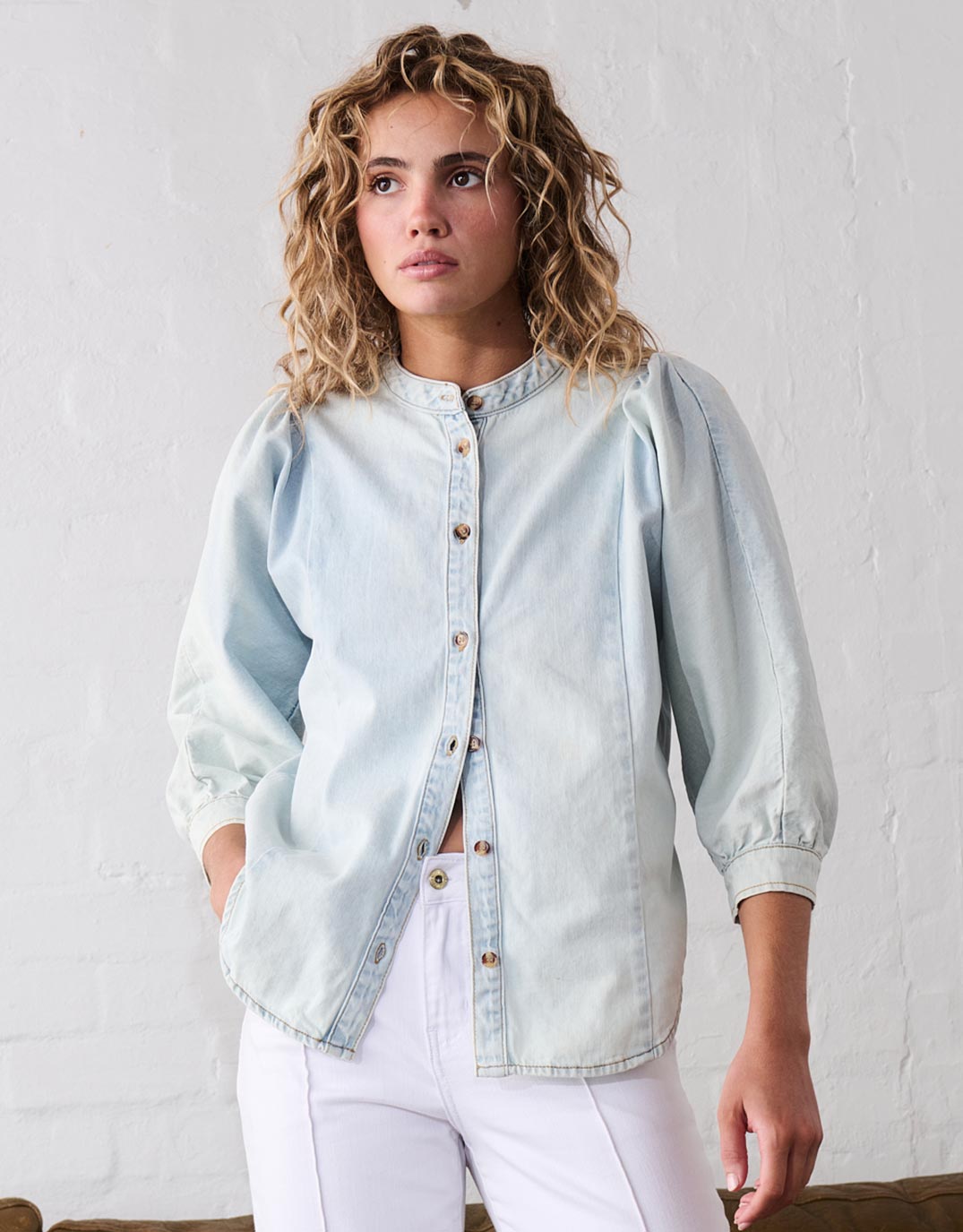 Image of a model wearing Tops. Productname: Gabriella Shirt - in Sky Blue colour by brand - Kireina
