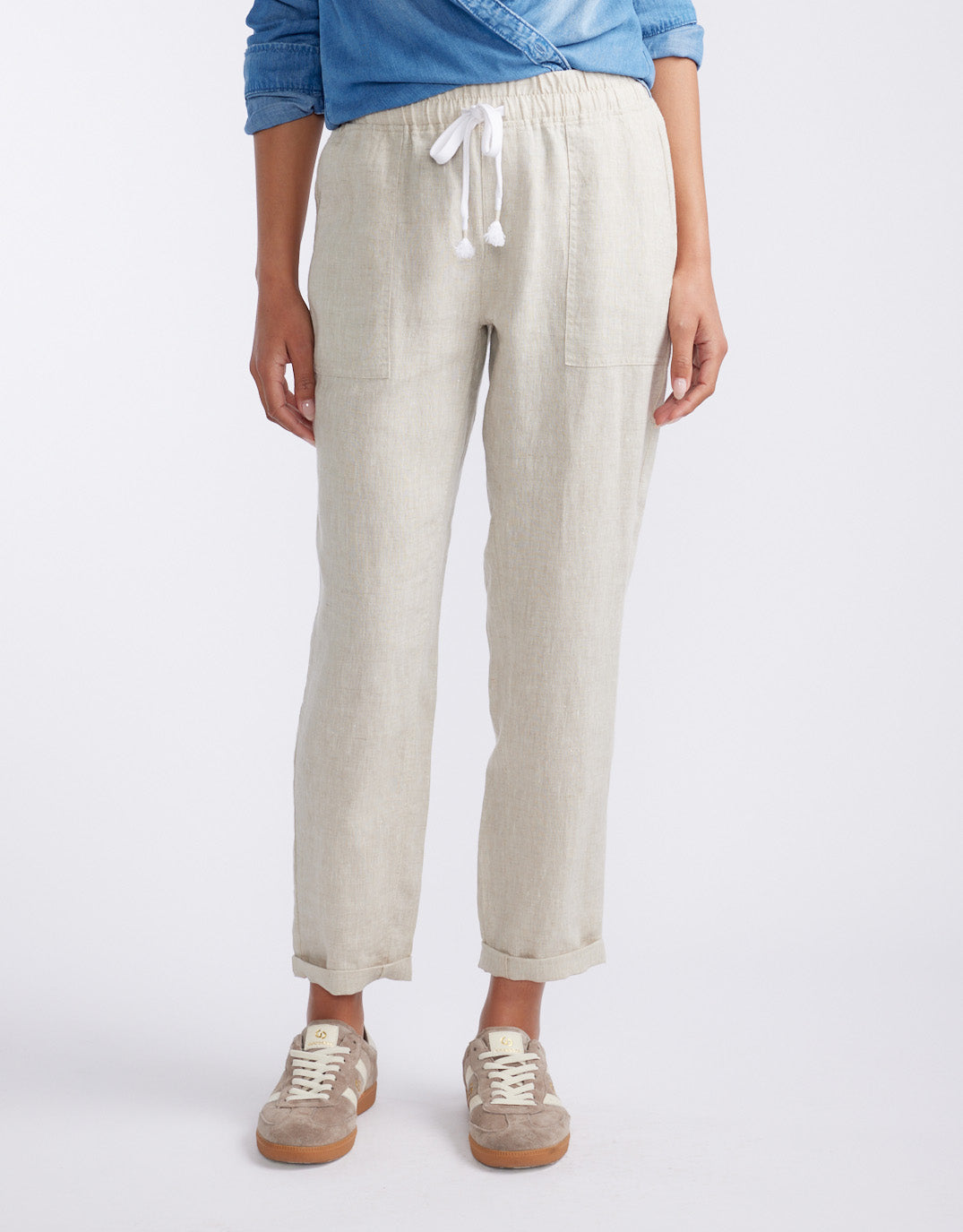 Image of a model wearing Pants. Product name - Linen Beach Comber Pant Natural in Natural colour by brand - White & Co.