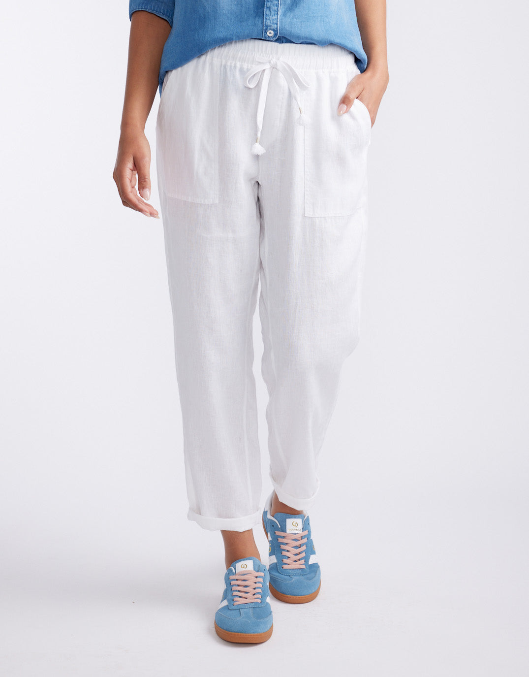 Image of a model wearing Pants. Product name - Linen Beach Comber Pant White in White colour by brand - White & Co.