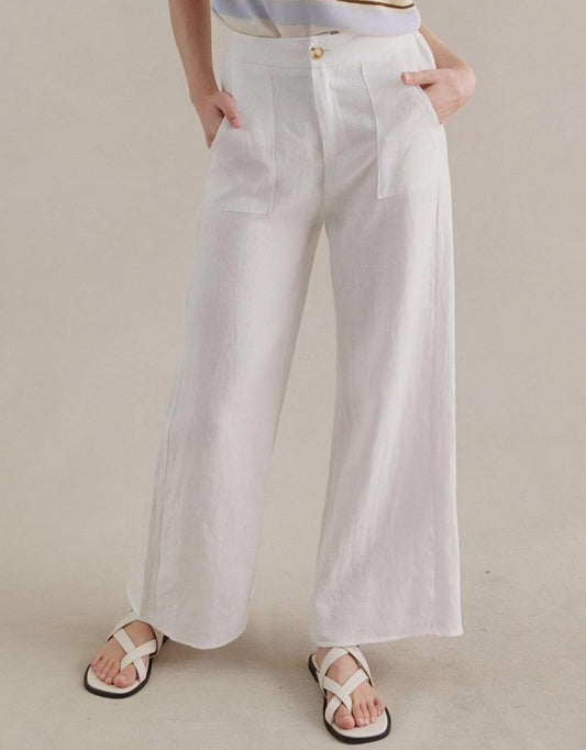 Image of a model wearing Pants. Productname: Jude Wide Leg Linen Pants - in White colour by brand - Little Lies