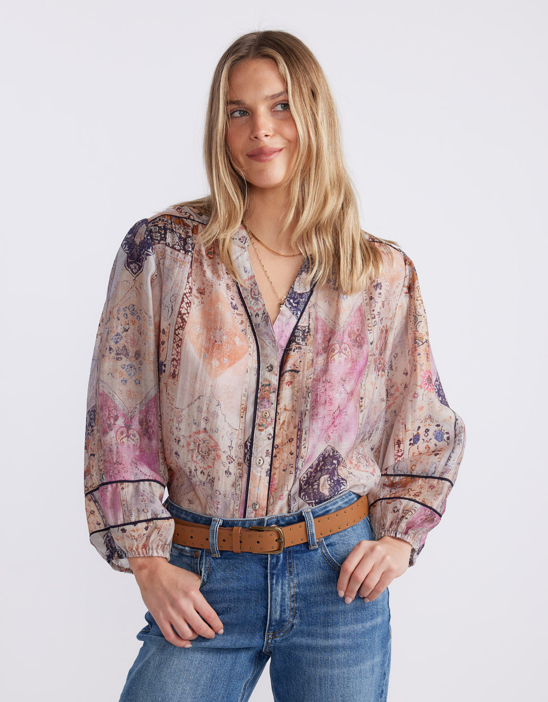 Image of a model wearing Tops. Product name - Mila Blouse Mosaic in Mosaic colour by brand - White & Co.