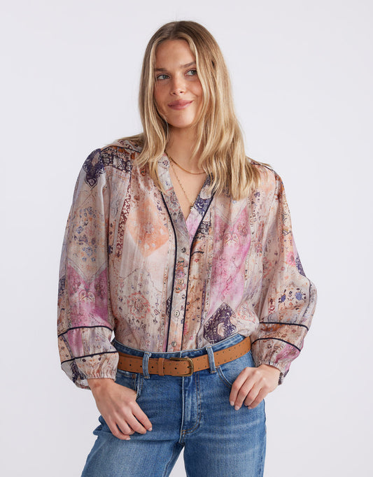 Image of a model wearing Tops. Product name - Mila Blouse Mosaic in Mosaic colour by brand - White & Co.