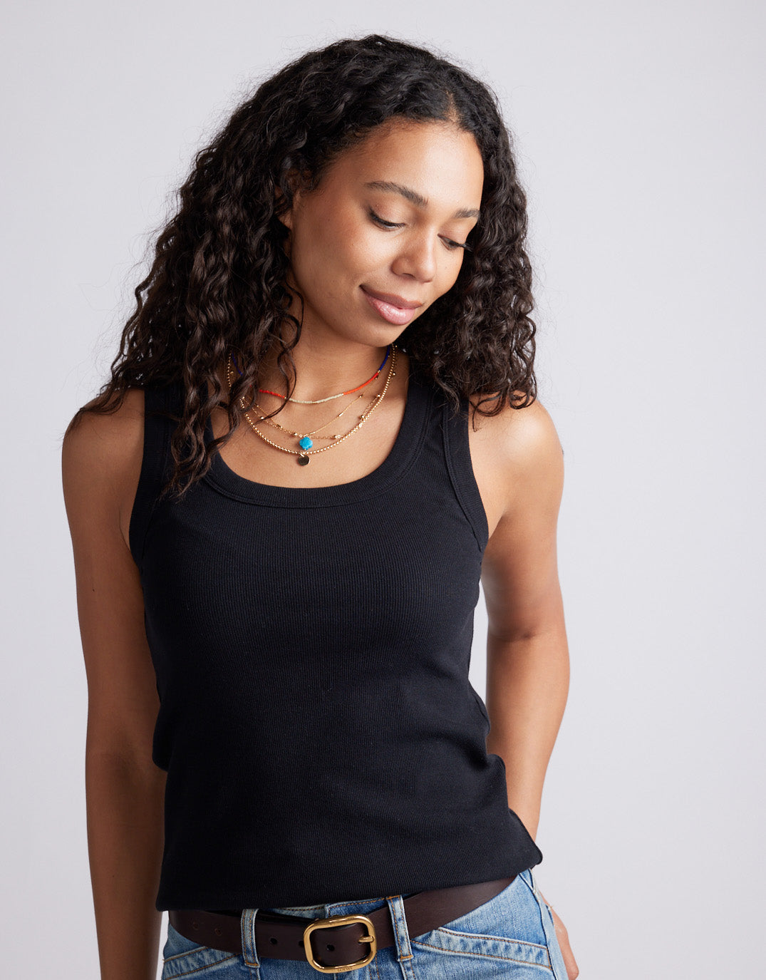 Image of T-Shirts. Product name - Rib Tank Black in Black colour by brand - White & Co.