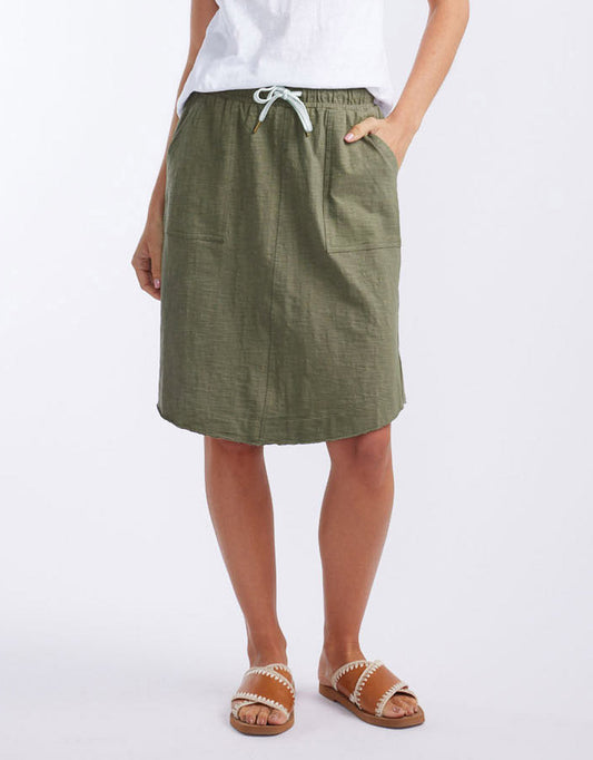 Image of a model wearing Skirts. Product name - Signature Skirt Khaki in Khaki colour by brand - White & Co.