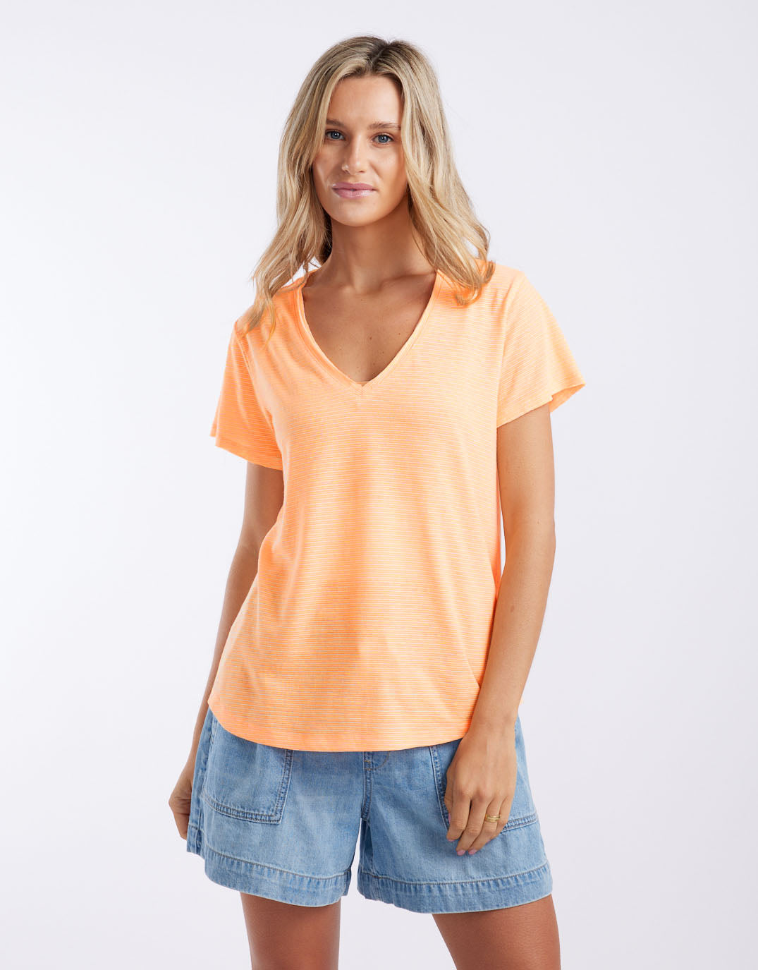 Image of a model wearing Tops. Productname: Sorbet Stripe Vee Neck Tee - in Neon Orange colour by brand - White & Co.