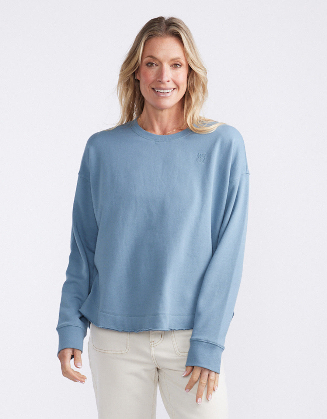 Image of Jeans. Product name - Staple Scoop Hem Sweat Denim in Denim colour by brand - White & Co.