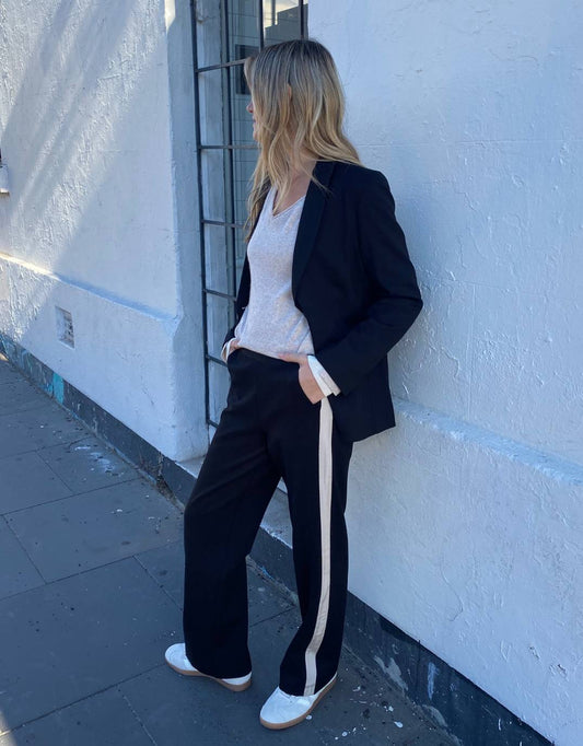 Image of a model wearing Pants. Productname: Timeless Straight Leg Ponte Pant - in Black/Natural colour by brand - White & Co.