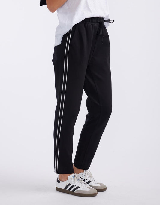 Image of a model wearing Pants. Productname: Everyday Ponte Jogger - in French Tape colour by brand - White & Co.