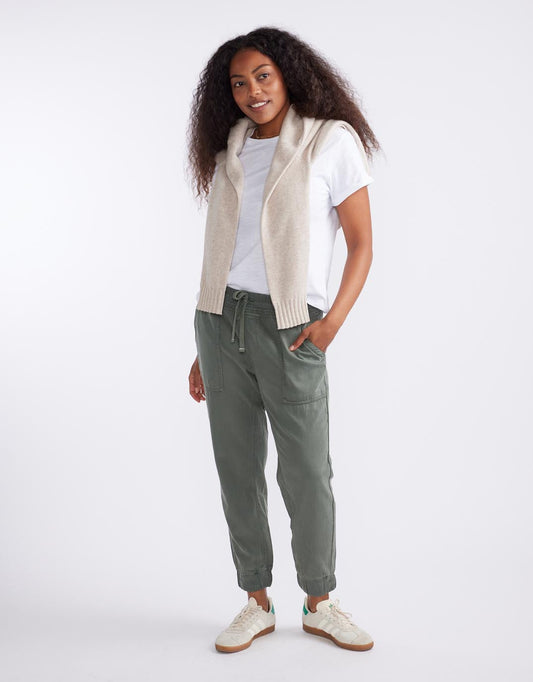 Image of a model wearing Pants. Productname: Weekend Utility Pants - in Khaki colour by brand - White & Co.