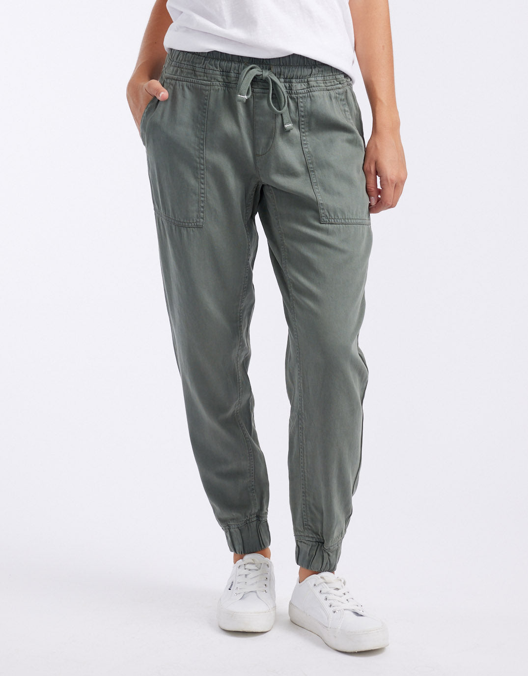 Image of a model wearing Pants. Productname: Weekend Utility Pants - in Khaki colour by brand - White & Co.
